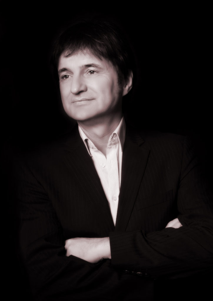 Profilbild von Olaf Kolibacz in schwarz-weiß